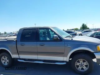 2003 Ford F-150 XLT with VIN 1FTRW08L63KD17116, listed as a IAAI auction lot 42811062 with Not provided miles and . Bid and sale history available at DreamBid. Image 13.