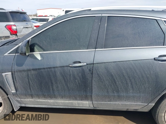2013 Cadillac SRX Performance Collection with VIN 3GYFNDE38DS598028, listed as a IAAI auction lot 41452362 with 201,261 mi miles and . Bid and sale history available at DreamBid. Image 14.