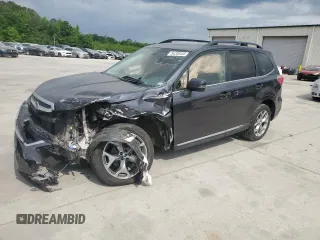 2017 Subaru Forester Touring z VIN JF2SJAWC4HH467501, wystawiony jako Copart lot #54208465 z przebiegiem 128 999 mil mil oraz Szkoda całkowita • Salvage title. Historia ofert i sprzedaży dostępna na DreamBid. Obrazek 1.