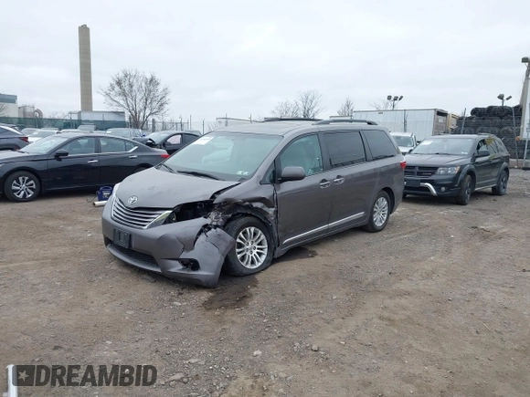 2016 Toyota Sienna XLE with VIN 5TDYK3DCXGS737846, listed as a IAAI auction lot 41782055 with 126,846 mi miles. Bid and sale history available at carsss.com. Image 2.