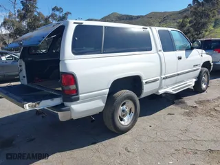 1998 Dodge Ram 1500 with VIN 1B7HF13Z6WJ260648, listed as a IAAI auction lot 41678745 with 242,876 mi miles. Bid and sale history available at carsss.com. Image 4.