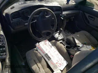 2000 Subaru Legacy L with VIN 4S3BE6353Y7216836, listed as a Copart auction lot 77437624 with Not provided miles and Salvage title. Bid and sale history available at DreamBid. Image 8.