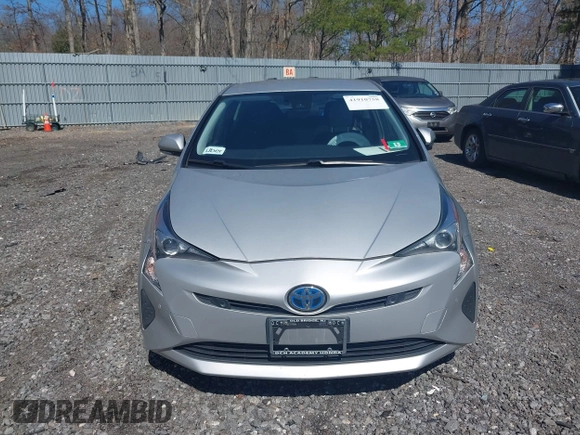 2018 Toyota Prius Two with VIN JTDKARFU5J3057086, listed as a IAAI auction lot 41910758 with 178,279 mi miles and . Bid and sale history available at DreamBid. Image 12.