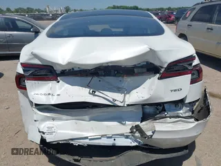 2017 Tesla Model S 100D with VIN 5YJSA1E20HF232570, listed as a IAAI auction lot 42037409 with 68,957 mi miles and . Bid and sale history available at DreamBid. Image 6.