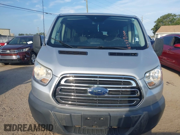 2018 Ford Transit Passenger XL with VIN 1FBZX2YM0JKA70128, listed as a IAAI auction lot 42379000 with 125,309 mi miles and . Bid and sale history available at DreamBid. Image 12.