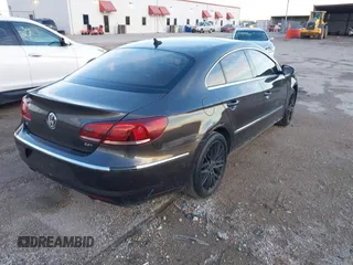 2015 Volkswagen CC Lux with VIN WVWRP7AN9FE819154, listed as a IAAI auction lot 41669832 with 151,142 mi miles. Bid and sale history available at carsss.com. Image 4.