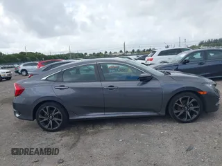 2019 Honda Civic Sport with VIN 2HGFC2F89KH563333, listed as a IAAI auction lot 41959217 with 66,068 mi miles and . Bid and sale history available at DreamBid. Image 13.