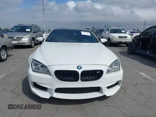 2013 BMW M6 z VIN WBSLX9C50DC968892, wystawiony jako IAAI lot #41935486 z przebiegiem 105 736 mil mil oraz . Historia ofert i sprzedaży dostępna na DreamBid. Obrazek 12.