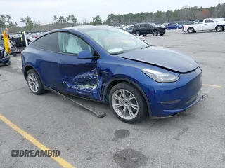 2023 Tesla Model Y Long Range with VIN 7SAYGDEE7PA194998, listed as a IAAI auction lot 41787170 with 16,221 mi miles and . Bid and sale history available at DreamBid. Image 1.
