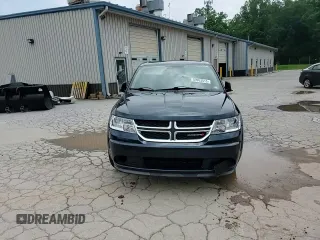 2013 Dodge Journey American Value with VIN 3C4PDCAB4DT581984, listed as a Copart auction lot 59953515 with 166,927 mi miles and Salvage title. Bid and sale history available at DreamBid. Image 15.