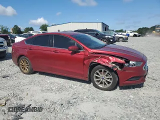2017 Ford Fusion SE with VIN 3FA6P0H74HR138164, listed as a Copart auction lot 60105485 with 199,528 mi miles and Salvage title. Bid and sale history available at DreamBid. Image 4.