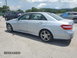2013 Mercedes-Benz E 350 Luxury with VIN WDDHF8JB0DA677751, listed as a Copart auction lot 64679035 with 74,983 mi miles and Salvage title. Bid and sale history available at DreamBid. Image 2.