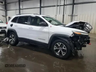 2014 Jeep Cherokee Trailhawk z VIN 1C4PJMBB5EW159957, wystawiony jako Copart lot #58535135 z przebiegiem 188 216 mil mil oraz Szkoda całkowita • Salvage title. Historia ofert i sprzedaży dostępna na DreamBid. Obrazek 4.