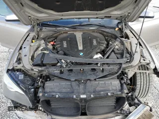 2012 BMW 7 Series 750Li с VIN WBAKB8C54CC965064, выставлен на аукционе Copart как лот 46308795 с пробегом 103 301 миль миль и Списание • Salvage title. История ставок и продаж доступна на DreamBid. Изображение 11.