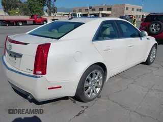 2008 Cadillac CTS RWD z VIN 1G6DV57V280142396, wystawiony jako IAAI lot #42086055 z przebiegiem 183 113 mil mil oraz . Historia ofert i sprzedaży dostępna na DreamBid. Obrazek 4.