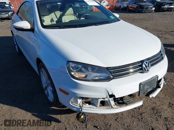 2015 Volkswagen Eos Komfort with VIN WVWBW8AH0FV001011, listed as a IAAI auction lot 41297299 with 81,444 mi miles and . Bid and sale history available at DreamBid. Image 17.