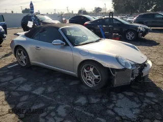 2005 Porsche 911 Carrera S z VIN WP0CB29995S765398, wystawiony jako Copart lot #42413555 z przebiegiem 32 993 mil mil oraz Szkoda całkowita • Salvage title. Historia ofert i sprzedaży dostępna na DreamBid. Obrazek 4.