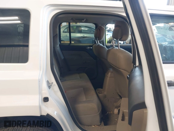 2011 Jeep Patriot Sport with VIN 1J4NT1GA9BD287751, listed as a IAAI auction lot 42035938 with 93,069 mi miles and . Bid and sale history available at carsss.com. Image 8.