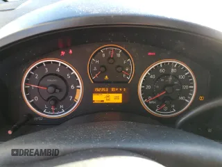2010 Nissan Titan SE with VIN 1N6BA0EK1AN312099, listed as a Copart auction lot 87882105 with 192,353 mi miles and Salvage Title. Bid and sale history available at carsss.com. Image 9.