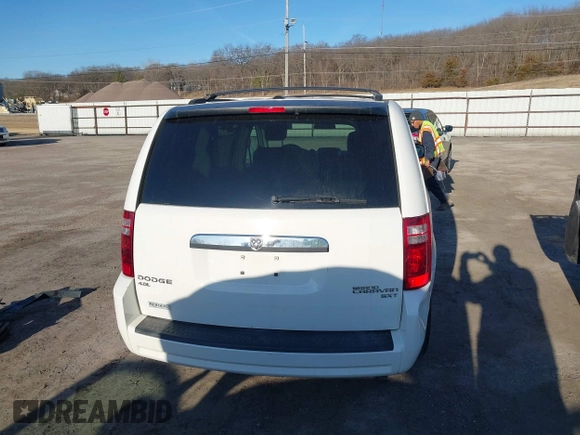2010 Dodge Grand Caravan SXT with VIN 2D4RN5DX8AR239352, listed as a IAAI auction lot 41773487 with 86,084 mi miles and . Bid and sale history available at DreamBid. Image 16.