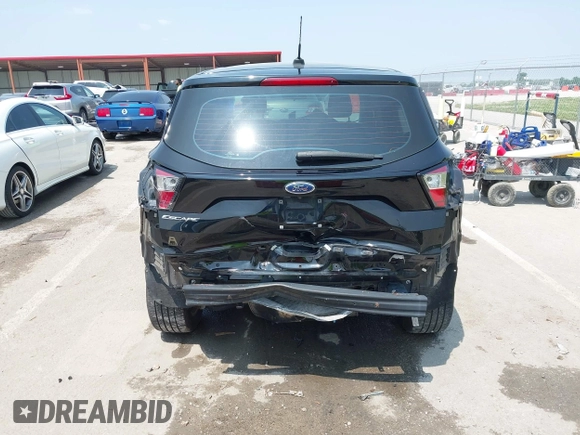 2018 Ford Escape S with VIN 1FMCU0F78JUB60610, listed as a IAAI auction lot 42447952 with 112,184 mi miles and . Bid and sale history available at DreamBid. Image 16.