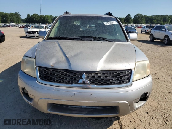 2011 Mitsubishi Endeavor LS with VIN 4A4JN2ASXBE027013, listed as a Copart auction lot 60397054 with 241,973 mi miles and Salvage Title. Bid and sale history available at carsss.com. Image 5.