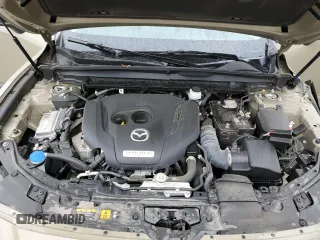 2023 Mazda CX-50 Premium Plus with VIN 7MMVABEY6PN113039, listed as a Copart auction lot 61629645 with 55,759 mi miles and Salvage title. Bid and sale history available at DreamBid. Image 12.