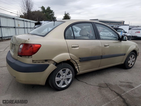 2009 Kia Rio SX with VIN KNADE223796524159, listed as a Copart auction lot 86185964 with 157,061 mi miles and Salvage Title. Bid and sale history available at carsss.com. Image 3.