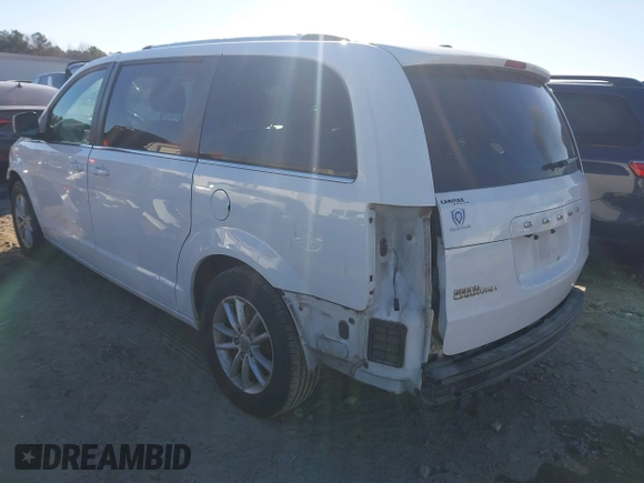 2019 Dodge Grand Caravan SXT with VIN 2C4RDGCG8KR761462, listed as a IAAI auction lot 41322097 with 132,110 mi miles. Bid and sale history available at carsss.com. Image 3.