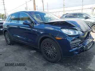 2014 Porsche Cayenne S z VIN WP1AB2A25ELA57941, wystawiony jako IAAI lot #41360634 z przebiegiem 46 113 mil mil oraz . Historia ofert i sprzedaży dostępna na DreamBid. Obrazek 1.