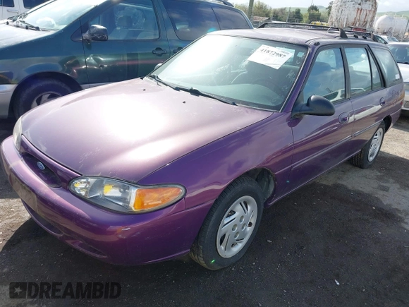 1997 Ford Escort LX with VIN 3FALP15P9VR137438, listed as a IAAI auction lot 41872987 with 134,606 mi miles. Bid and sale history available at carsss.com. Image 2.