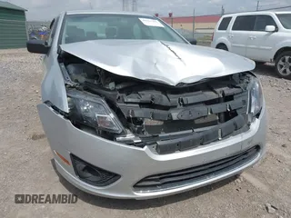 2012 Ford Fusion S with VIN 3FAHP0GA3CR127140, listed as a IAAI auction lot 42127986 with 83,447 mi miles and . Bid and sale history available at carsss.com. Image 6.