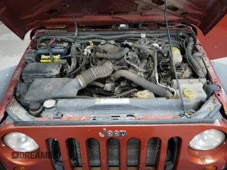 2009 Jeep Wrangler Unlimited X с VIN 1J8GA39139L788480, выставлен на аукционе Copart как лот 63013635 с пробегом 166 007 миль миль и Чистый • Clean title. История ставок и продаж доступна на DreamBid. Изображение 11.