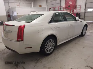 2011 Cadillac CTS Sedan Luxury with VIN 1G6DG5EY0B0144100, listed as a IAAI auction lot 41064767 with 87,922 mi miles. Bid and sale history available at carsss.com. Image 4.