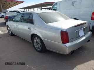 2002 Cadillac DeVille DTS with VIN 1G6KF57972U262315, listed as a IAAI auction lot 41537606 with 151,664 mi miles. Bid and sale history available at carsss.com. Image 3.