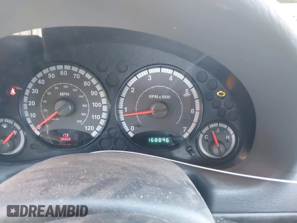 2005 Jeep Liberty Sport with VIN 1J4GL48K35W645419, listed as a IAAI auction lot 41823845 with 168,896 mi miles. Bid and sale history available at carsss.com. Image 7.