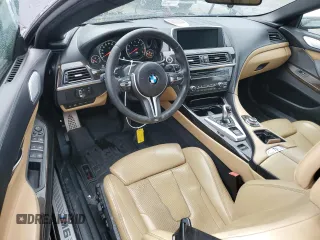 2014 BMW M6 z VIN WBSLZ9C50EDZ78599, wystawiony jako Copart lot #84724974 z przebiegiem 115 051 mil mil oraz Czysty tytuł • Clean title. Historia ofert i sprzedaży dostępna na DreamBid. Obrazek 8.