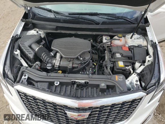 2022 Cadillac XT5 FWD Premium Luxury z VIN 1GYKNCRS0NZ175748, wystawiony jako Copart lot #61651885 z przebiegiem 13 747 mil mil oraz Szkoda całkowita • Salvage title. Historia ofert i sprzedaży dostępna na DreamBid. Obrazek 12.