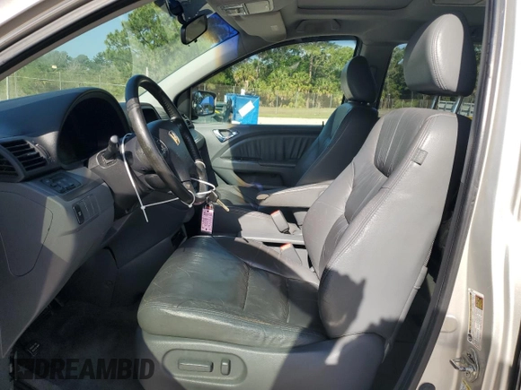 2007 Honda Odyssey EX-L with VIN 5FNRL387X7B043046, listed as a Copart auction lot 52604635 with 228,961 mi miles and Salvage Title. Bid and sale history available at carsss.com. Image 7.