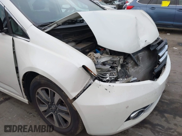 2014 Honda Odyssey Touring with VIN 5FNRL5H94EB001479, listed as a IAAI auction lot 41123678 with 147,269 mi miles and . Bid and sale history available at carsss.com. Image 17.