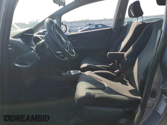 2010 Honda Fit Sport with VIN JHMGE8H47AS023964, listed as a Copart auction lot 61797995 with 78,518 mi miles and Salvage title. Bid and sale history available at DreamBid. Image 7.