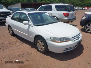 2002 Honda Accord EX z VIN 1HGCG16592A037760, wystawiony jako IAAI lot #42334100 z przebiegiem 271 805 mil mil oraz . Historia ofert i sprzedaży dostępna na DreamBid. Obrazek 1.