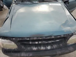 1996 Ford Explorer XL с VIN 1FMDU34X9TUC66723, выставлен на аукционе Copart как лот 86659774 с пробегом 190 164 миль миль и Списание • Salvage title. История ставок и продаж доступна на DreamBid. Изображение 13.