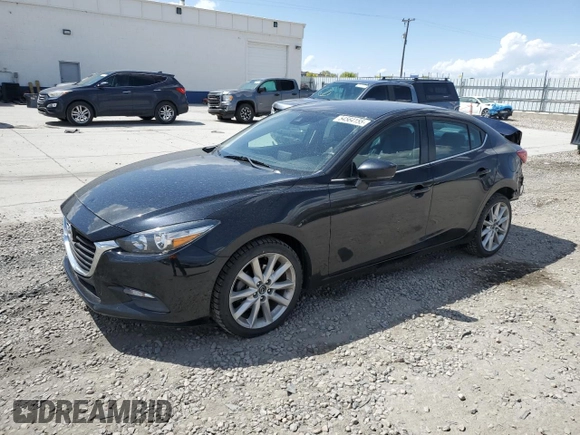 2017 Mazda 3 Touring z VIN 3MZBN1V79HM124716, wystawiony jako Copart lot #54564155 z przebiegiem 80 625 mil mil oraz Szkoda całkowita • Salvage title. Historia ofert i sprzedaży dostępna na DreamBid. Obrazek 1.
