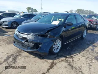 2013 Toyota Camry L with VIN 4T1BF1FK1DU666784, listed as a IAAI auction lot 41869487 with 99,396 mi miles. Bid and sale history available at carsss.com. Image 2.
