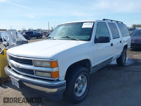 1997 Chevrolet Suburban with VIN 3GNFK16R4VG126095, listed as a IAAI auction lot 41548470 with 290,502 mi miles. Bid and sale history available at carsss.com. Image 2.