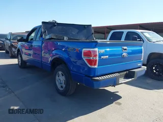 2014 Ford F-150 XL with VIN 1FTEX1CM7EFC70627, listed as a IAAI auction lot 41976216 with 31,676 mi miles. Bid and sale history available at carsss.com. Image 3.