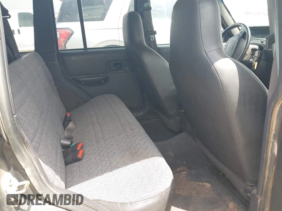 2001 Jeep Cherokee Sport with VIN 1J4FF48S31L601063, listed as a IAAI auction lot 42302200 with 251,308 mi miles and . Bid and sale history available at DreamBid. Image 8.