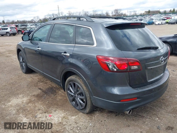2015 Mazda CX-9 Grand Touring with VIN JM3TB3DV1F0465966, listed as a IAAI auction lot 42049749 with 74,470 mi miles and . Bid and sale history available at DreamBid. Image 3.