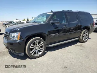 2014 Chevrolet Suburban LS with VIN 1GNSCHE03ER132039, listed as a Copart auction lot 68390234 with 129,744 mi miles and Salvage Title. Bid and sale history available at carsss.com. Image 1.
